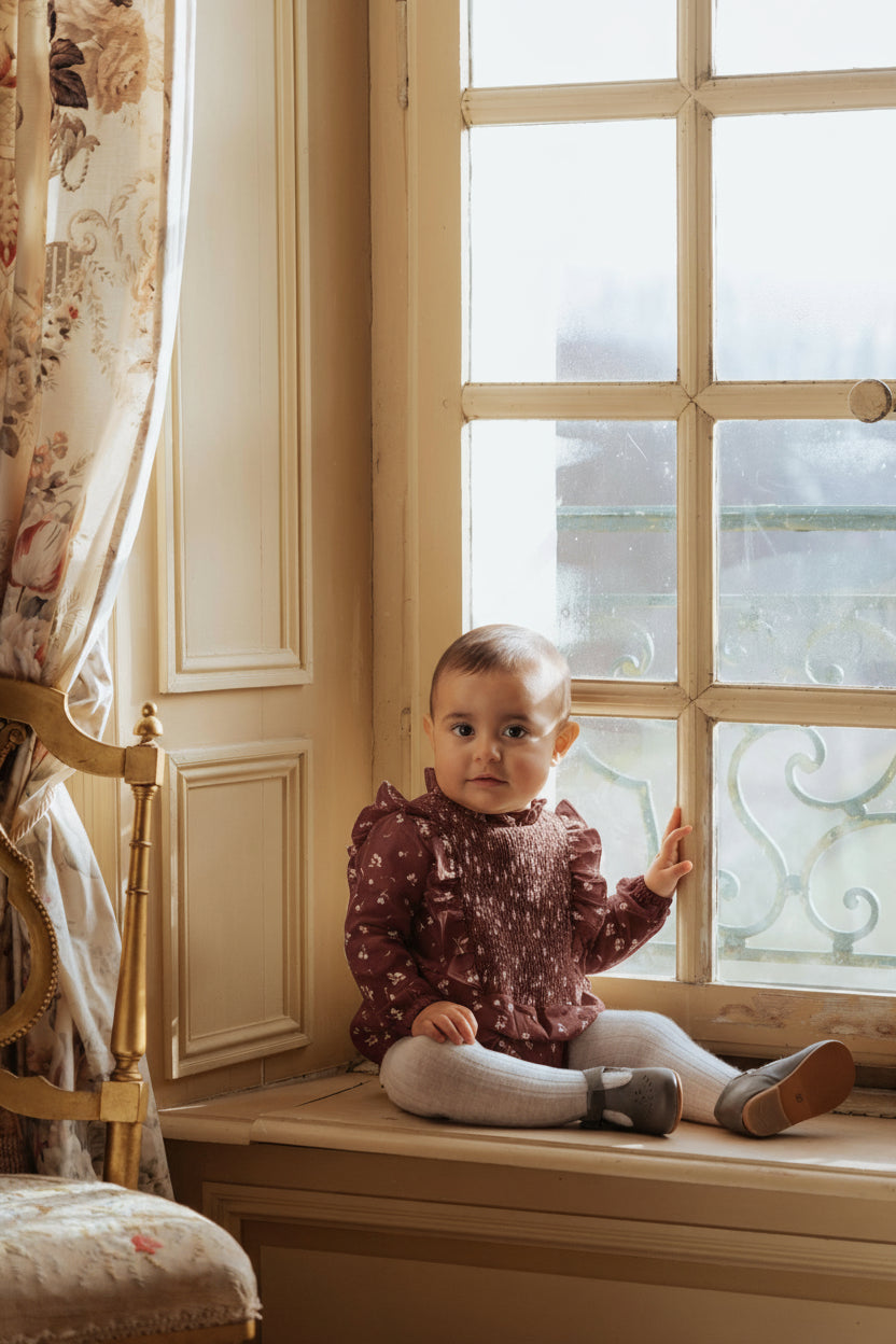 combinaison bébé Luiza plum tulip en coton bio prune et smocks