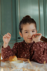 Blouse fille bordeaux à manche bouffantes en coton biologique